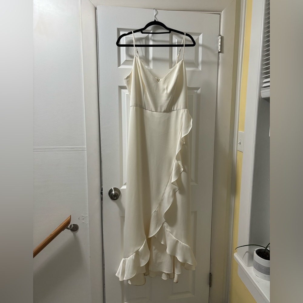 Used once for a wedding! In good shape but should be dry cleaned.
